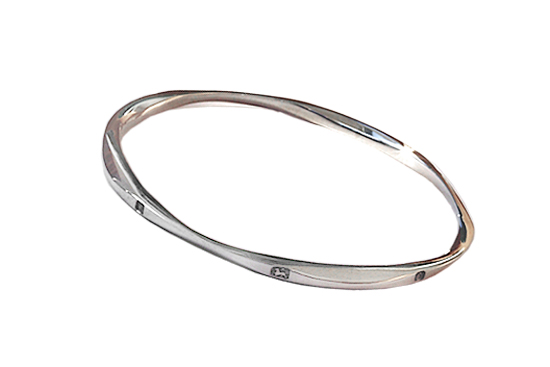 Sterling silver orbital pattern bangle