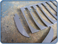 Blades and springs are first cut out of sheet steel